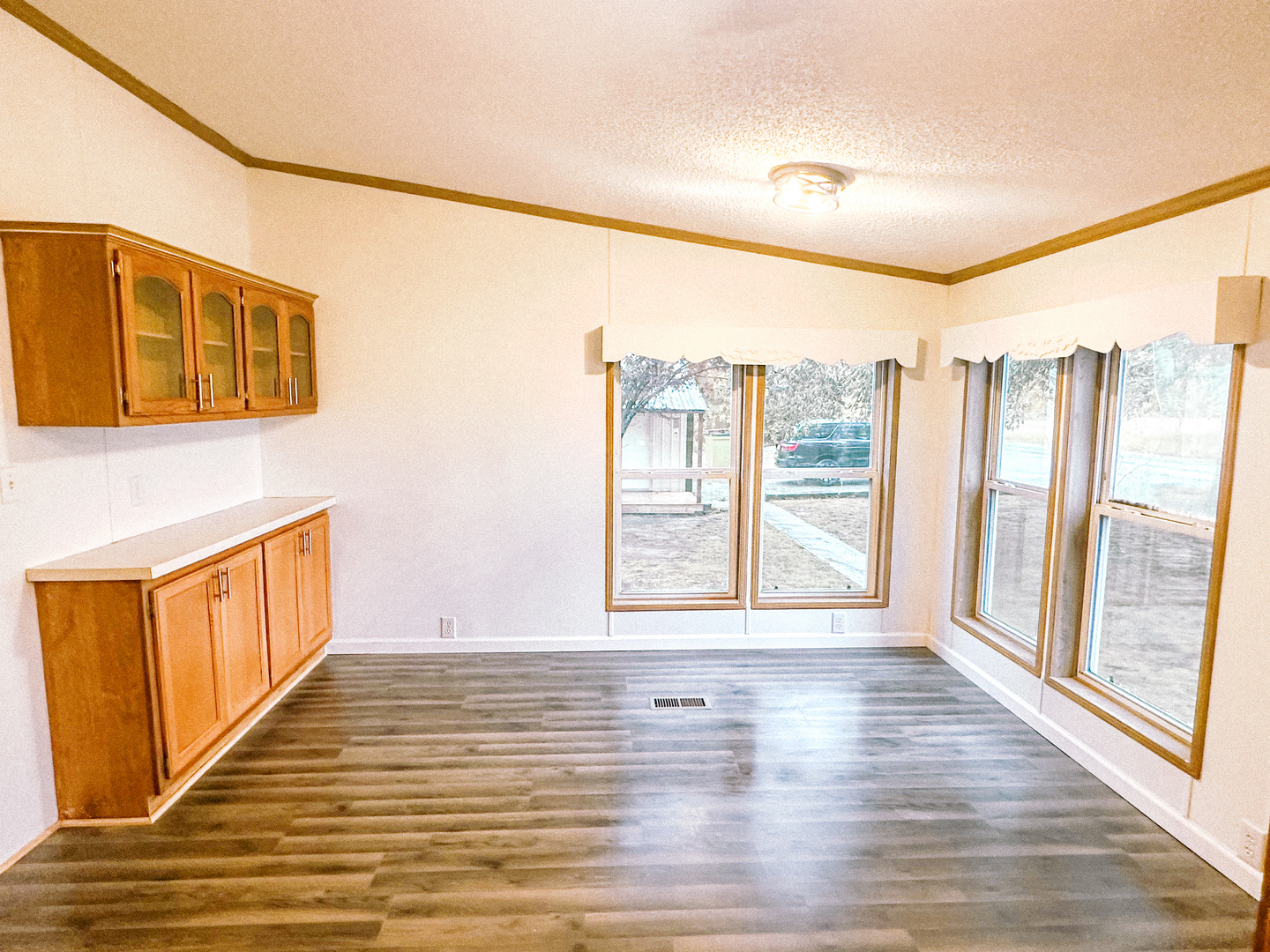 4920 Mt Moriah Road Galatia, IL 62935 - Photo 16 of 33 a view of an empty room with wooden floor and a window