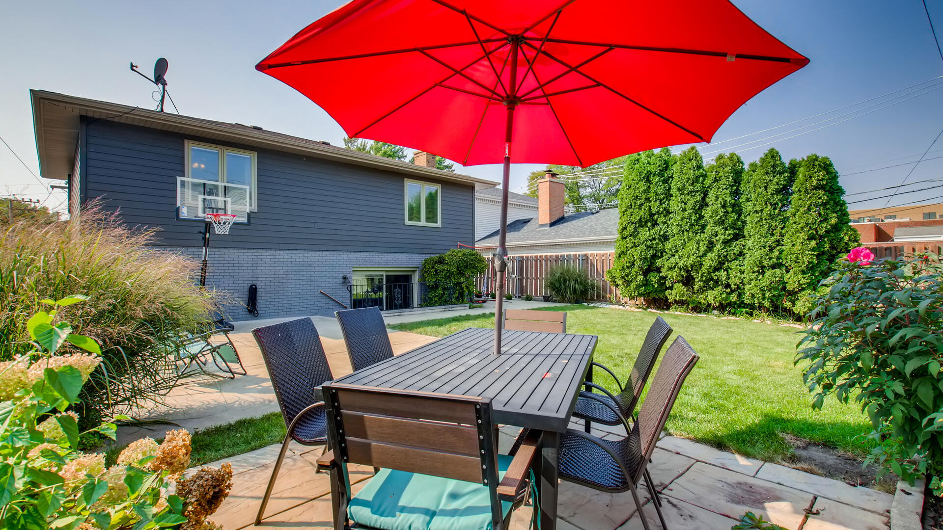 4511 Wolf Road Western Springs, IL 60558 - Photo 23 of 26 a view of backyard of house with seating space
