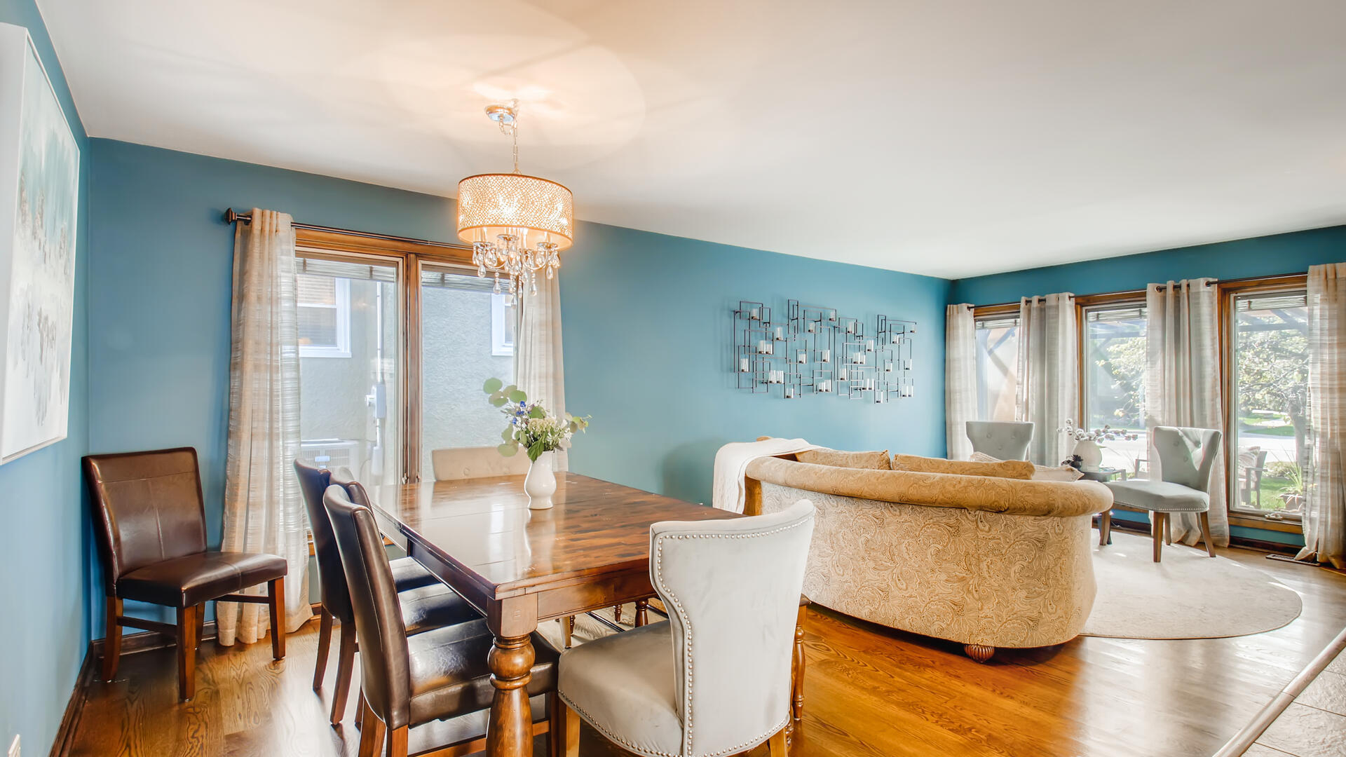 4511 Wolf Road Western Springs, IL 60558 - Photo 7 of 26 a dining room with furniture and wooden floor