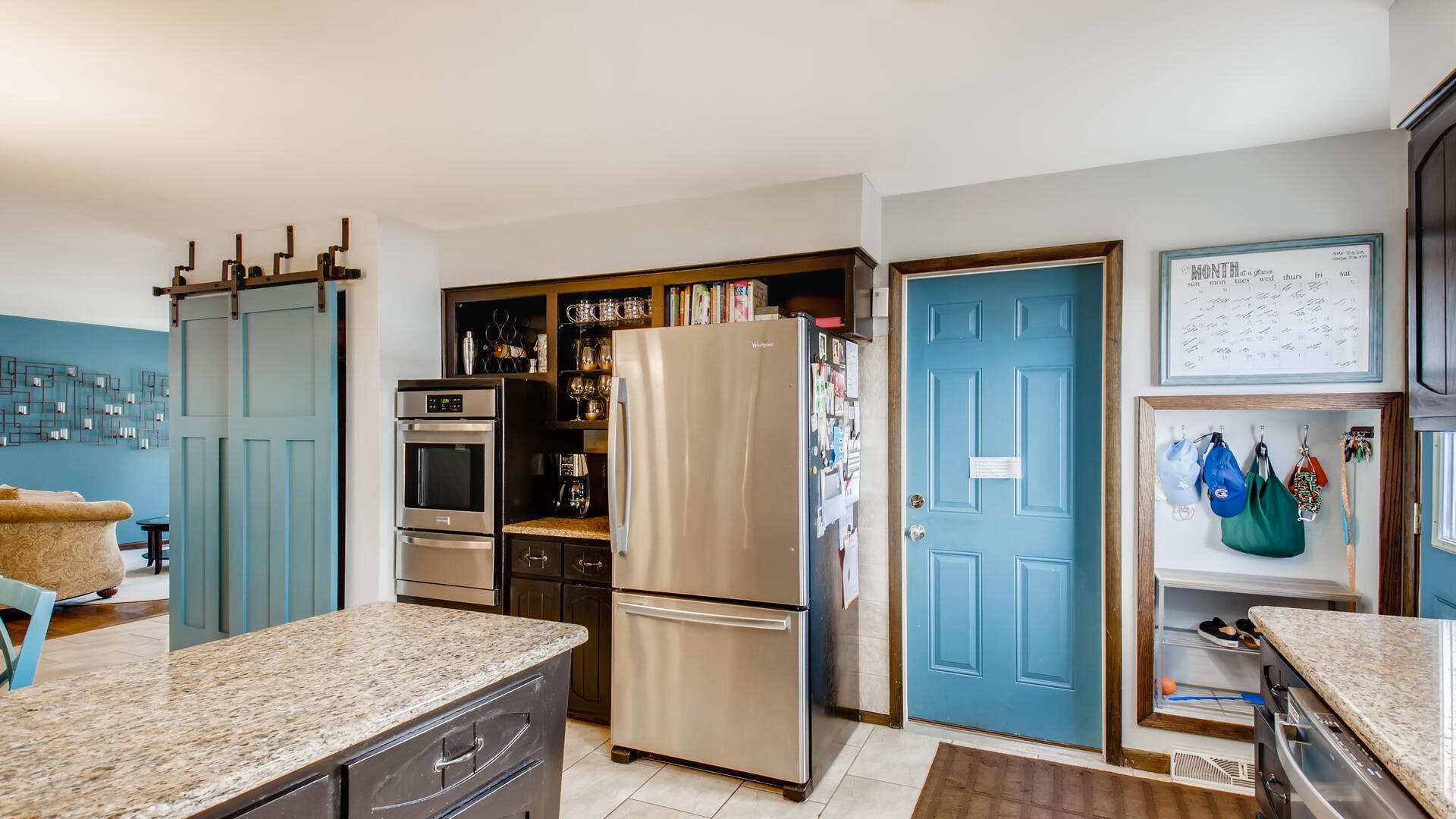 4511 Wolf Road Western Springs, IL 60558 - Photo 8 of 26 a kitchen with stainless steel appliances granite countertop a refrigerator and a sink