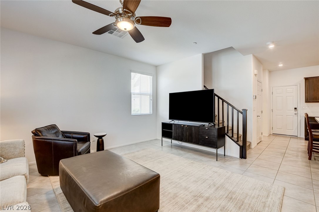 484 Filaree Place Henderson, NV 89015 - Photo 15 of 71 This bright living area features modern finishes and easy access to other parts of the home.