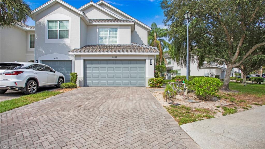 16149 Ravina Way, Unit 29 Naples, FL 34110 - Photo 2 of 39 Two car garage and extra long driveway