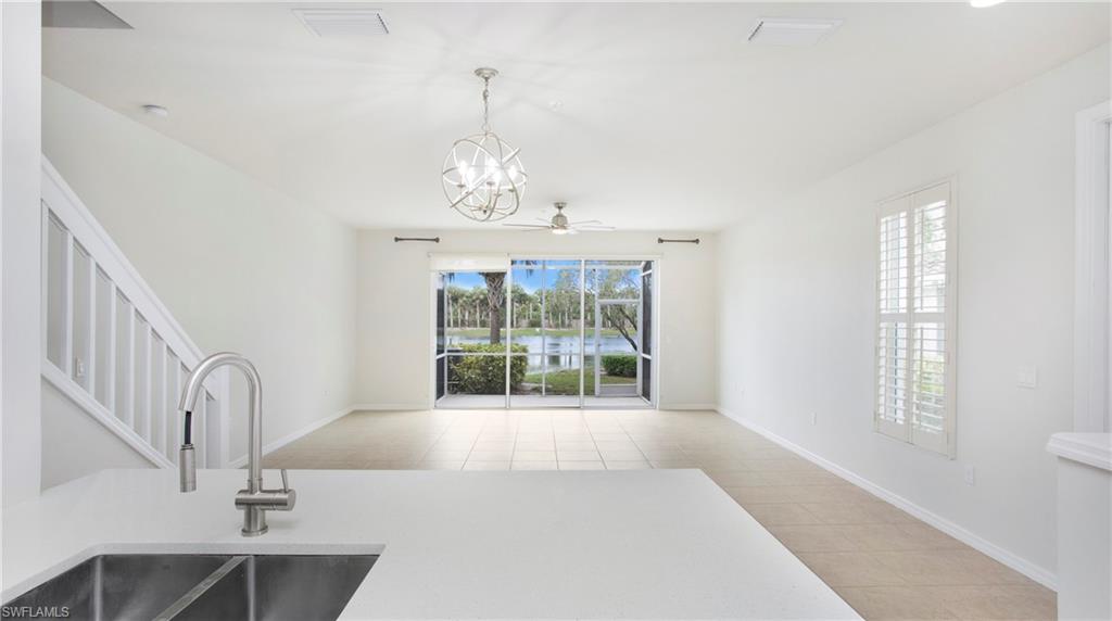 16149 Ravina Way, Unit 29 Naples, FL 34110 - Photo 8 of 39 View of the lake from the kitchen