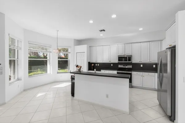 $442,500 | 7102 Prado Lake Drive, Delray Beach, FL 33446