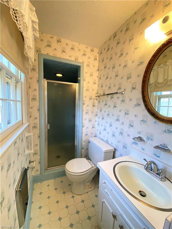 933 Lemons Road Stokesdale, NC 27357 - Photo 12 of 33 Master bathroom with walk-in shower