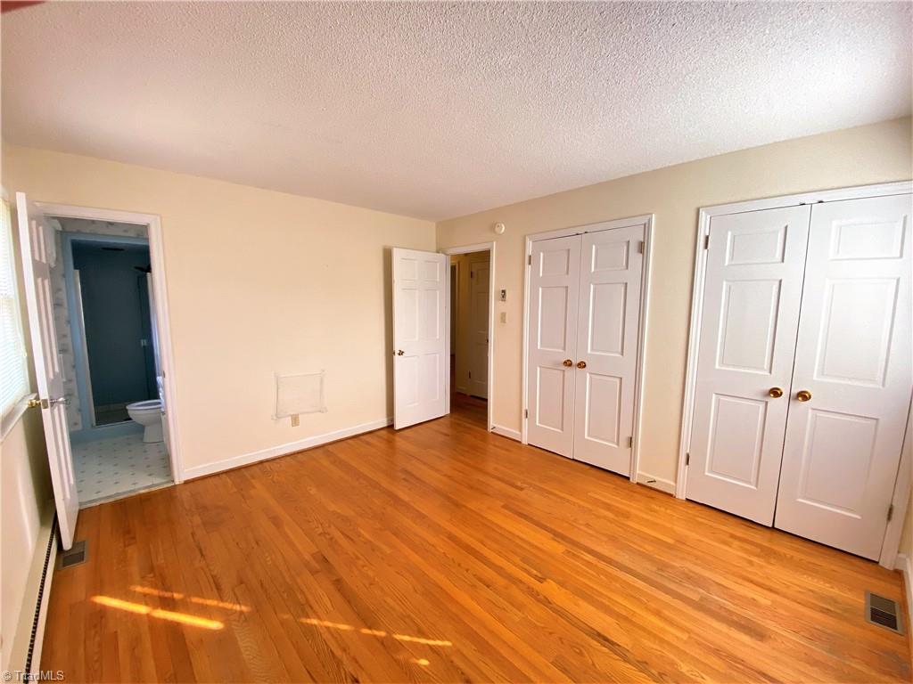 933 Lemons Road Stokesdale, NC 27357 - Photo 10 of 33 Master bedroom with double closets