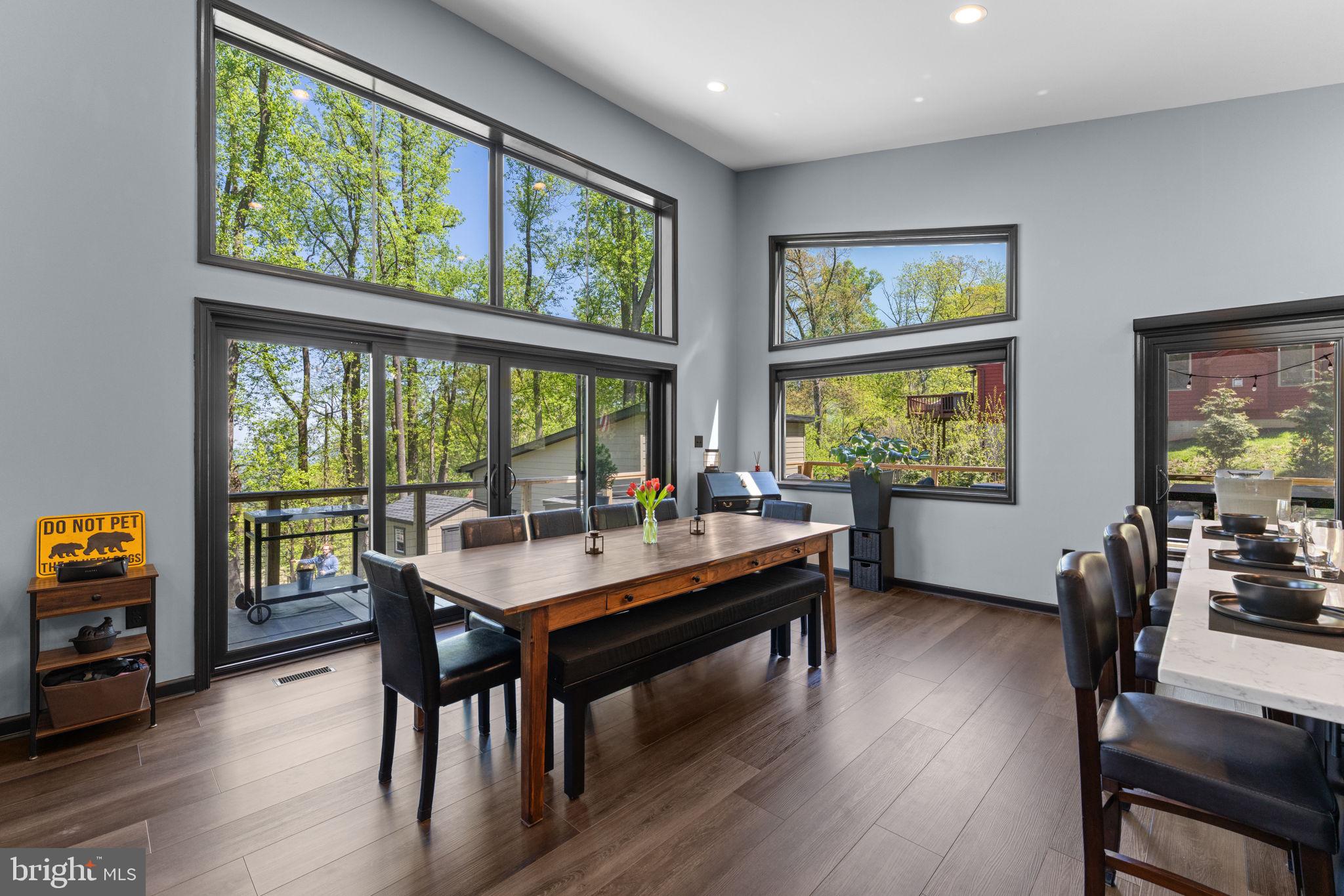 753 Club House Road Front Royal, VA 22630 - Photo 17 of 98 a view of a dining room with furniture window and wooden floor