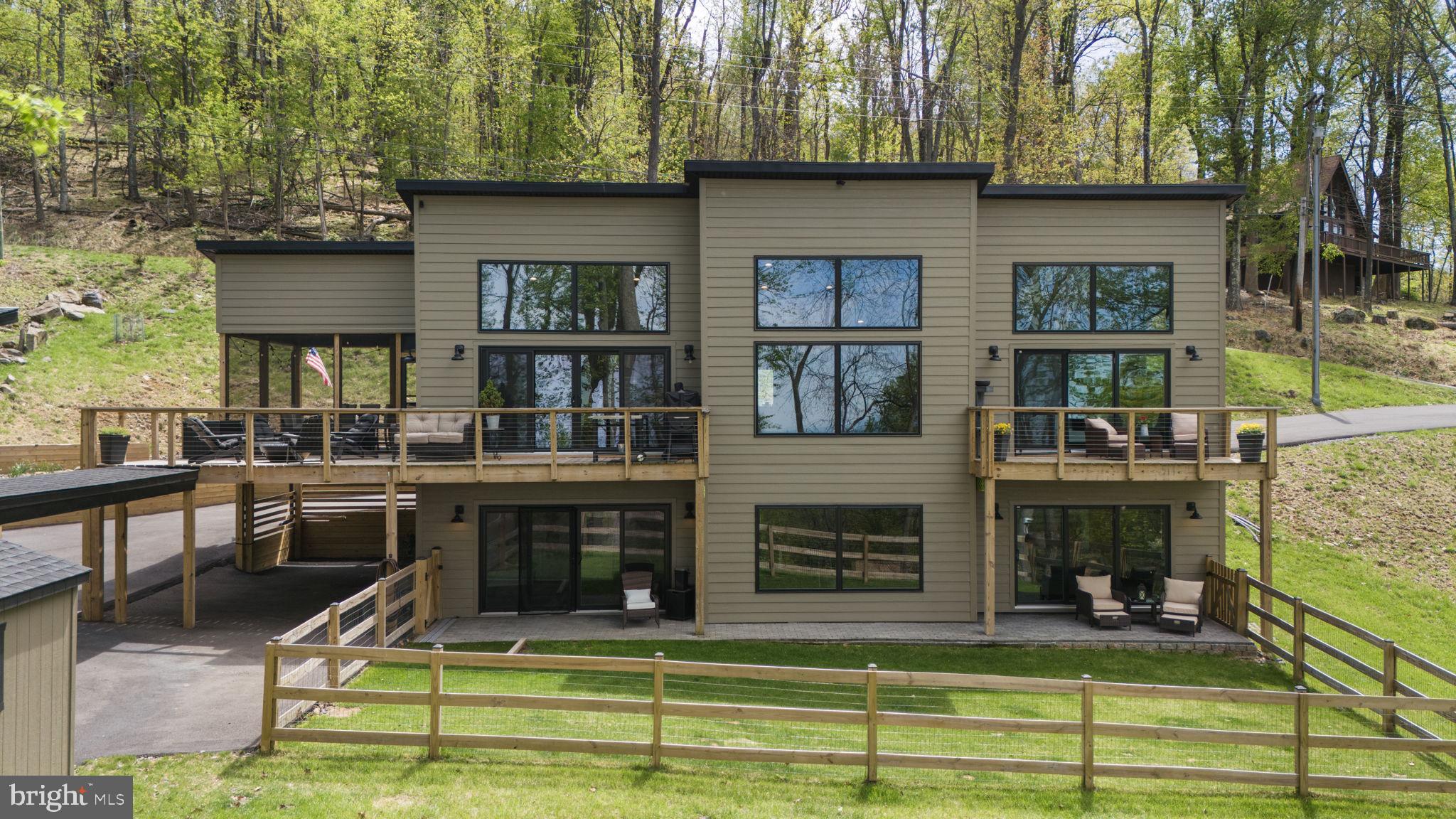 753 Club House Road Front Royal, VA 22630 - Photo 2 of 98 a swimming pool view with a outdoor seating