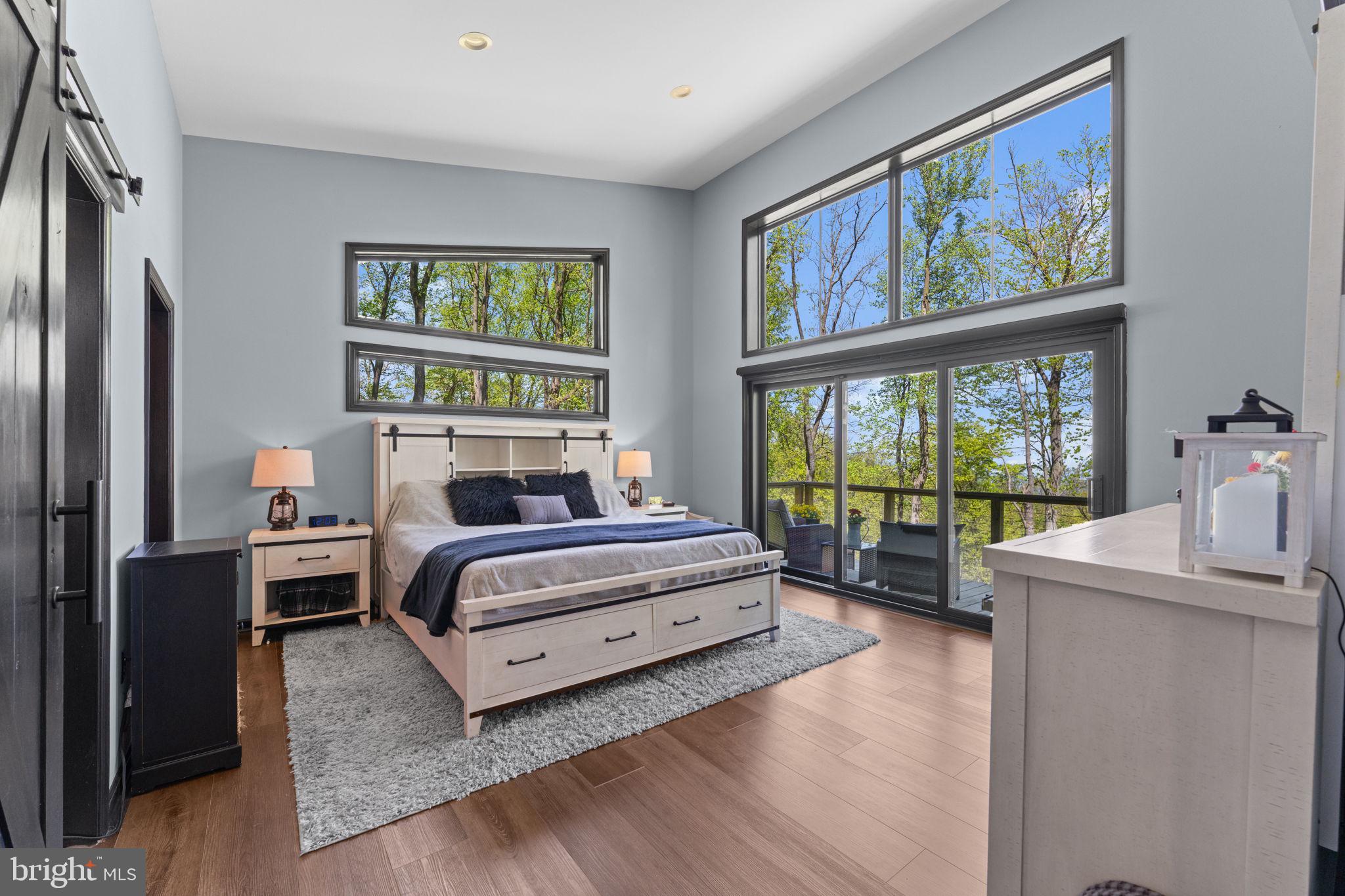 753 Club House Road Front Royal, VA 22630 - Photo 29 of 98 a bedroom with a bed and a large window