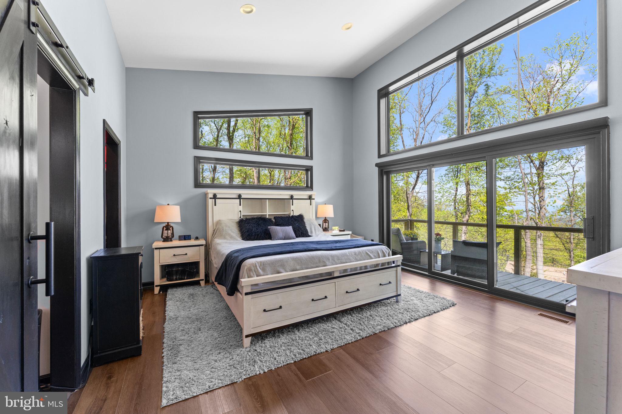753 Club House Road Front Royal, VA 22630 - Photo 30 of 98 a bedroom with a bed and a large window