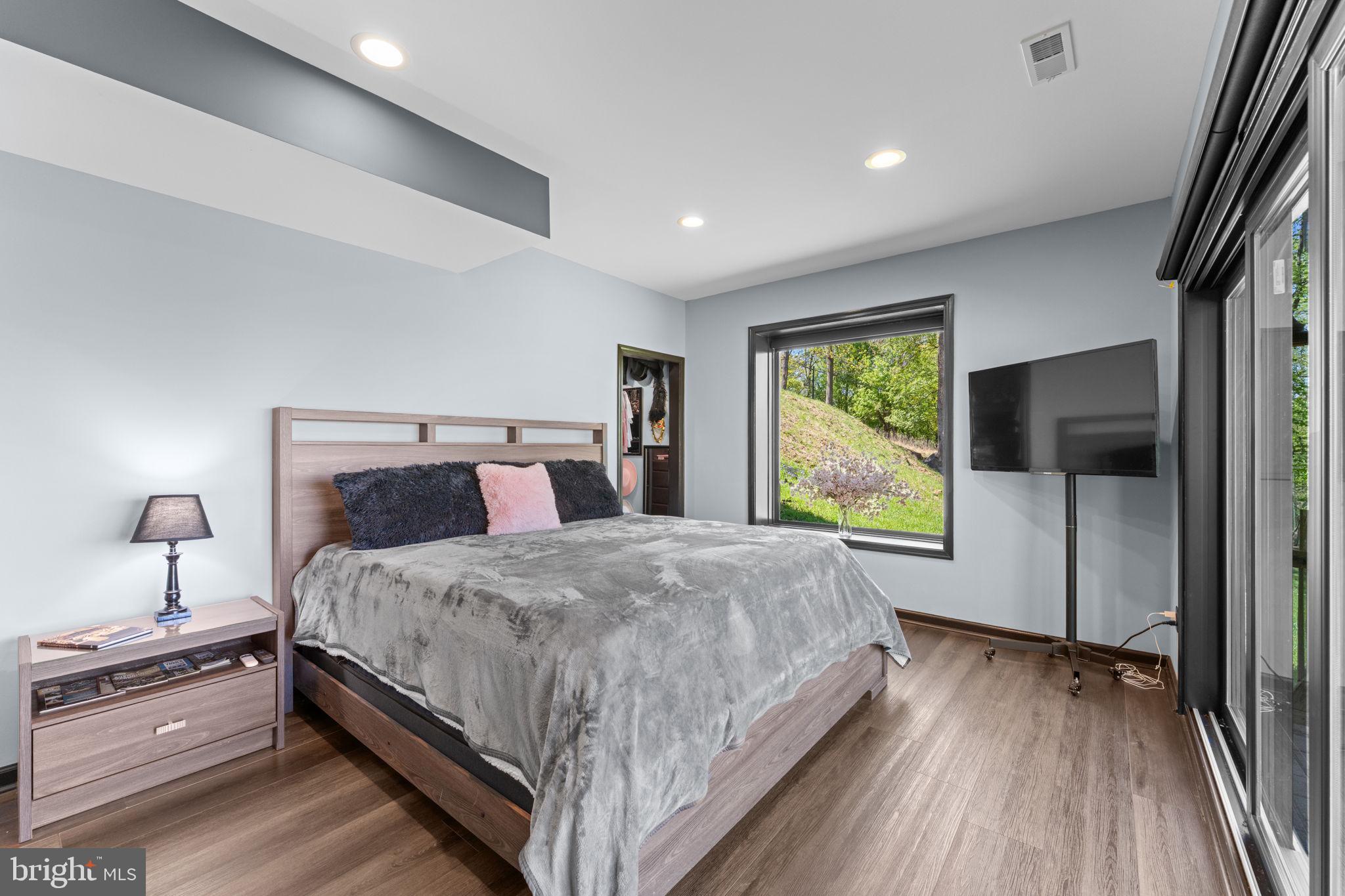 753 Club House Road Front Royal, VA 22630 - Photo 49 of 98 a bedroom with a large bed and a window