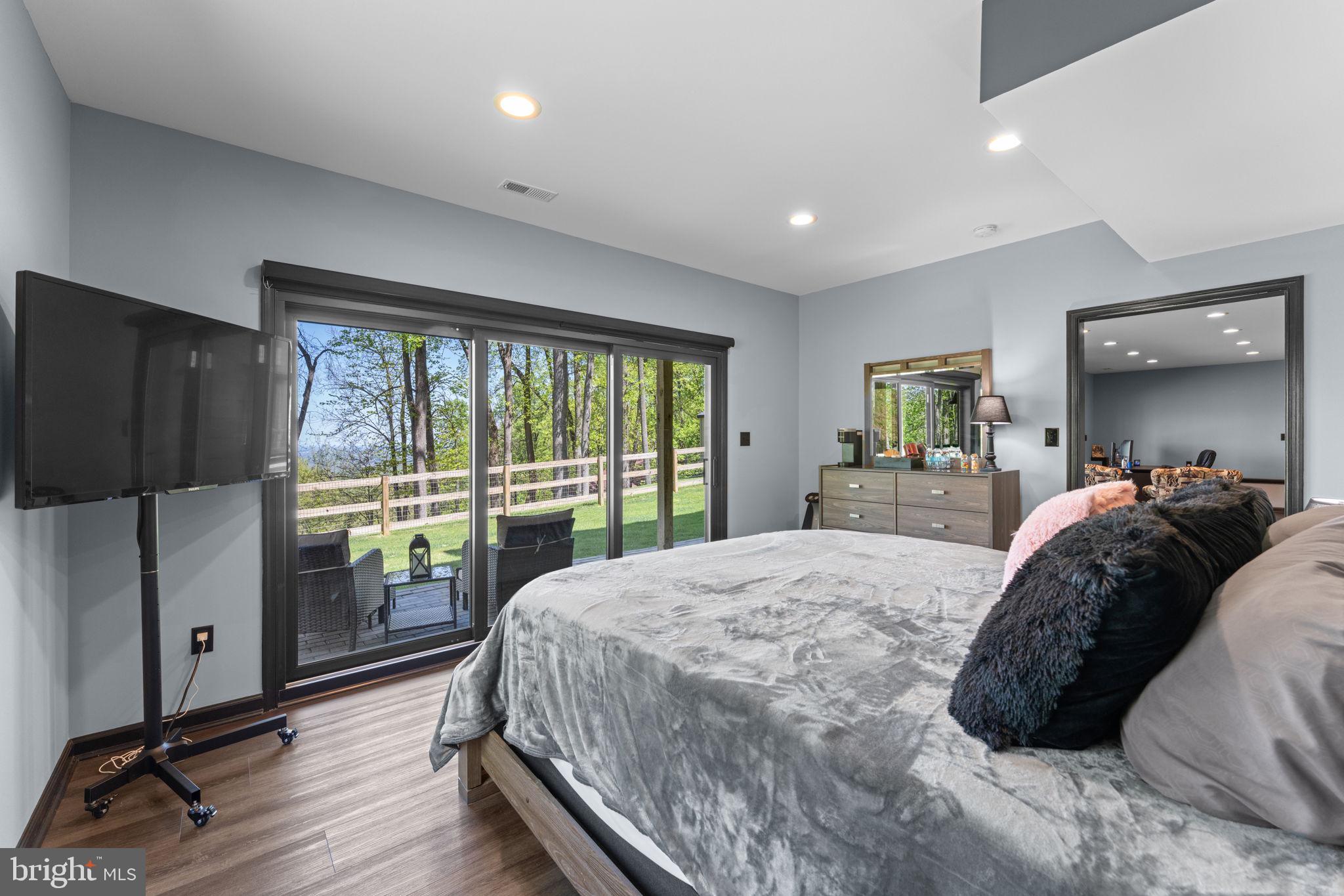 753 Club House Road Front Royal, VA 22630 - Photo 51 of 98 a bed room with a bed and a large window