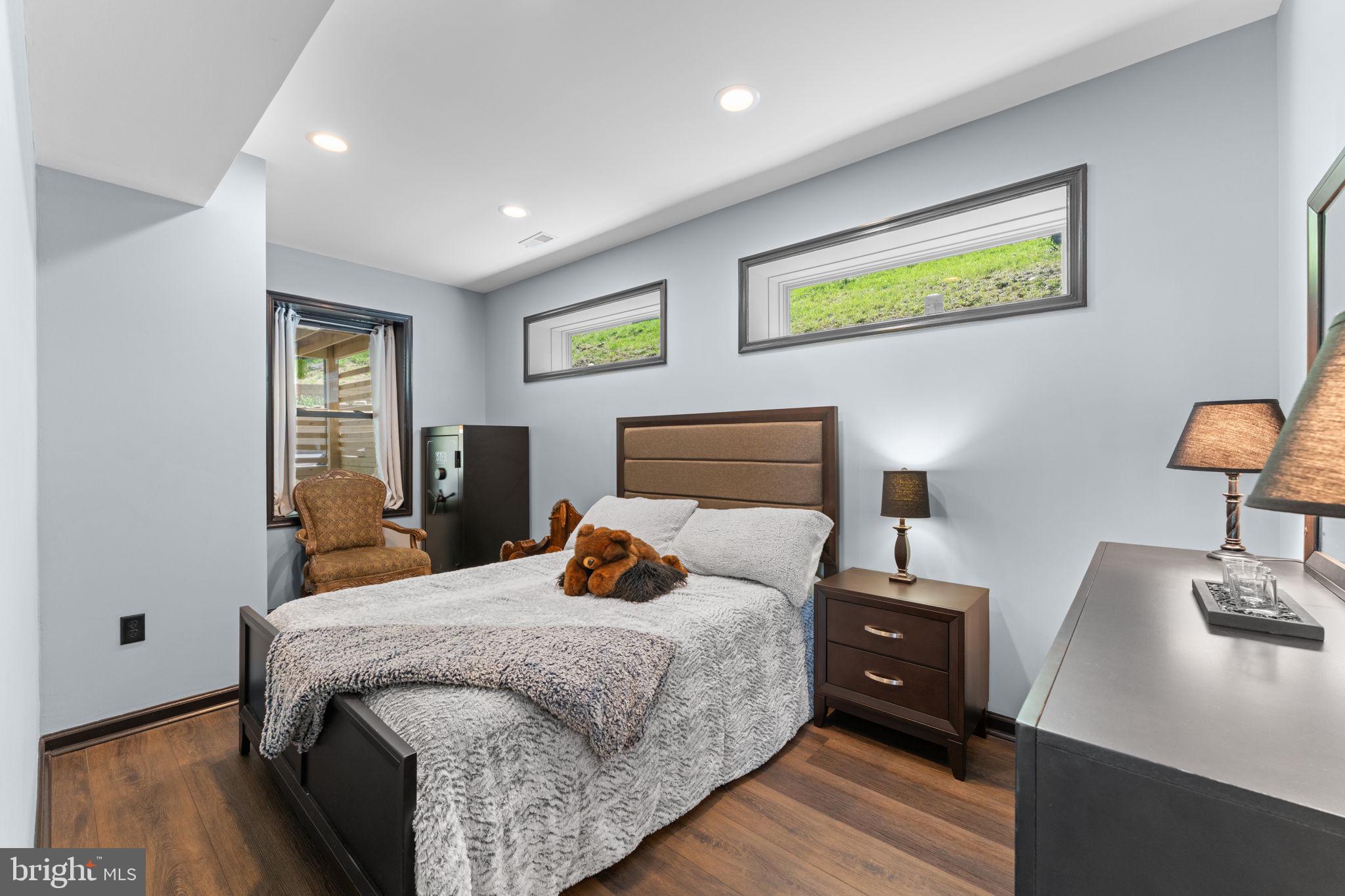 753 Club House Road Front Royal, VA 22630 - Photo 53 of 98 a bedroom with a bed and wooden floor