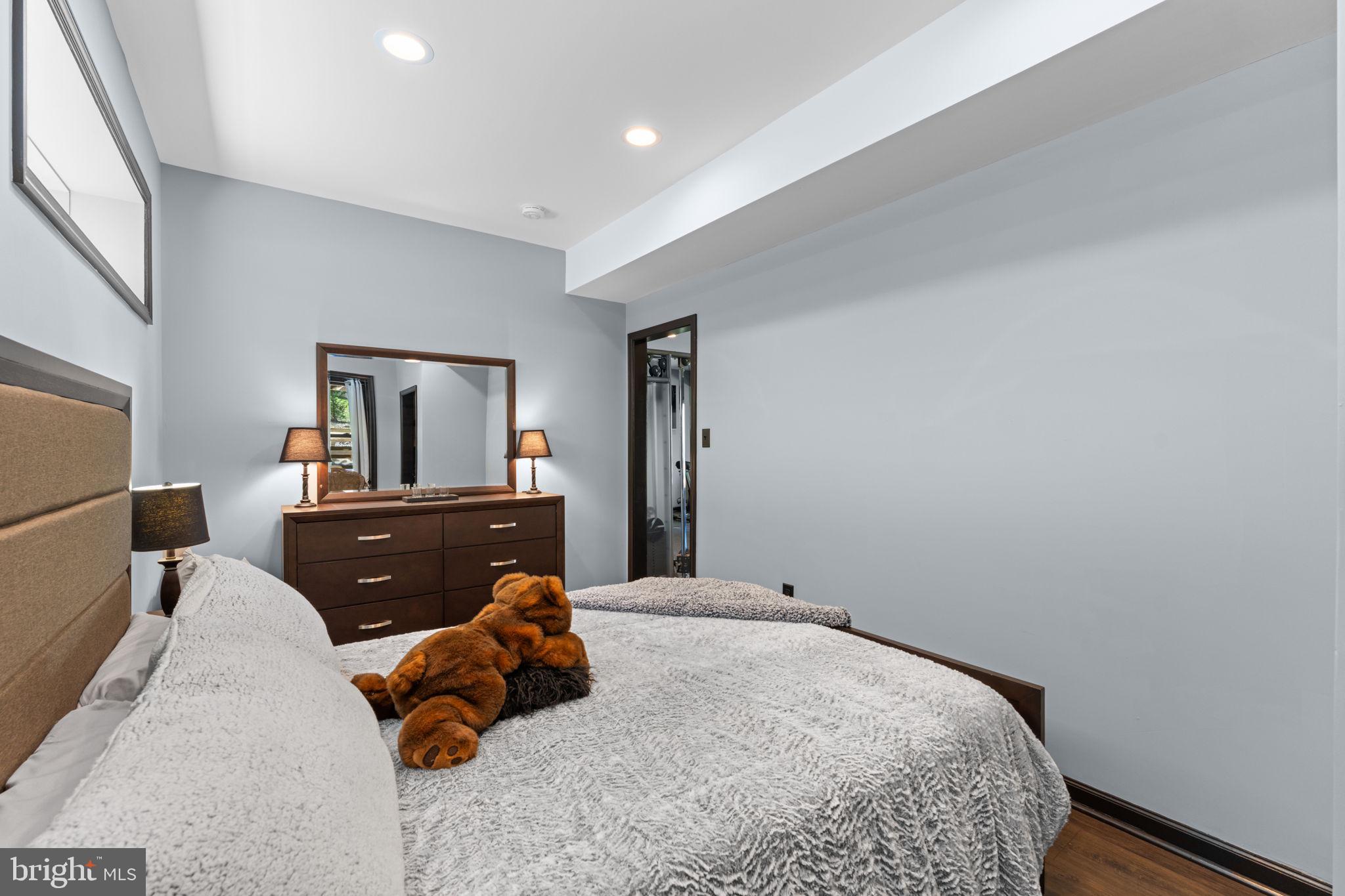 753 Club House Road Front Royal, VA 22630 - Photo 54 of 98 a bedroom with a bed and wooden floor