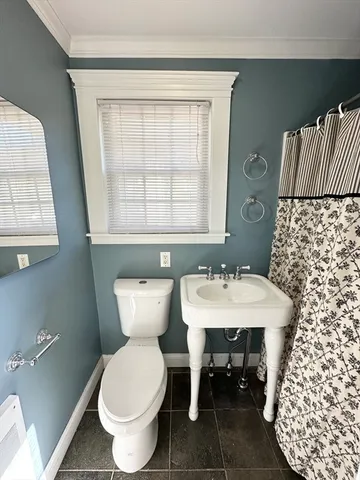a bathroom with a sink and a toilet