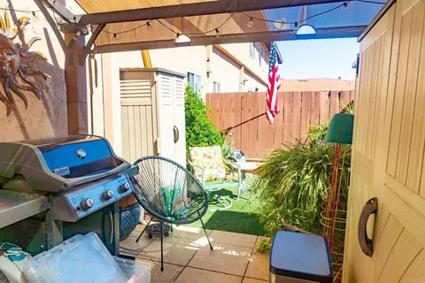 a backyard of a house with seating space