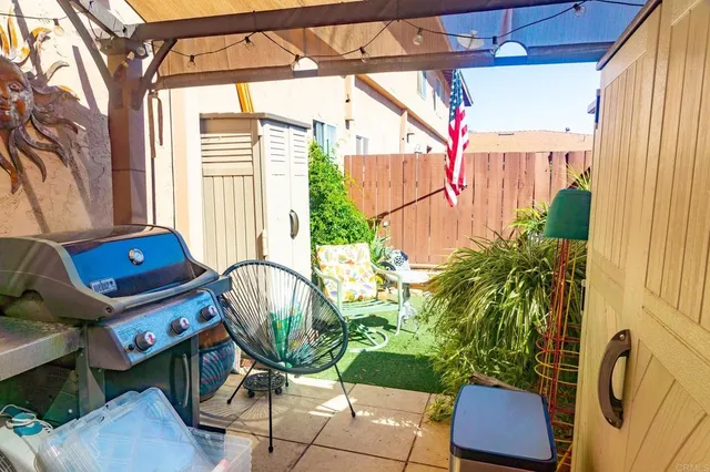 a backyard of a house with seating space