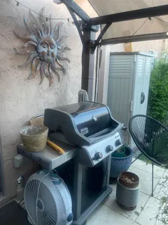 a lamp on a table and a chair