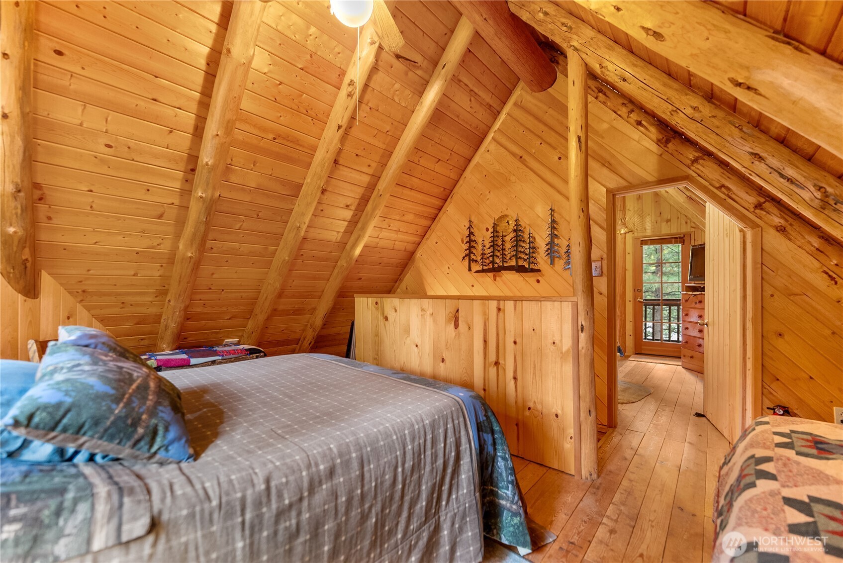 26 Mercer Road Mazama, WA 98833 - Photo 15 of 40 a bedroom with a bed and a shower