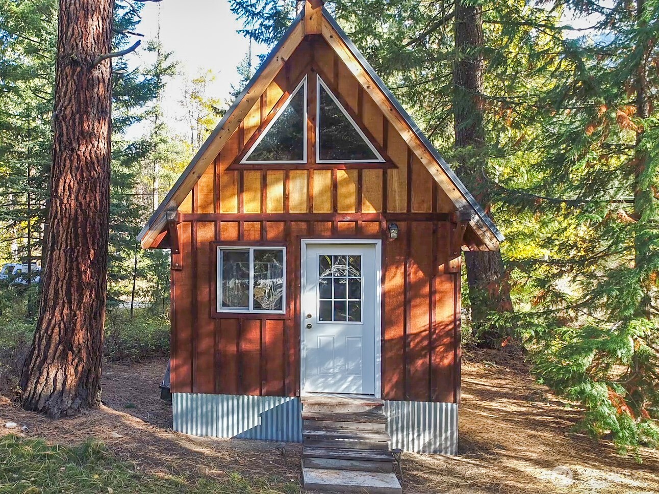 26 Mercer Road Mazama, WA 98833 - Photo 33 of 40 a view of a house with a yard