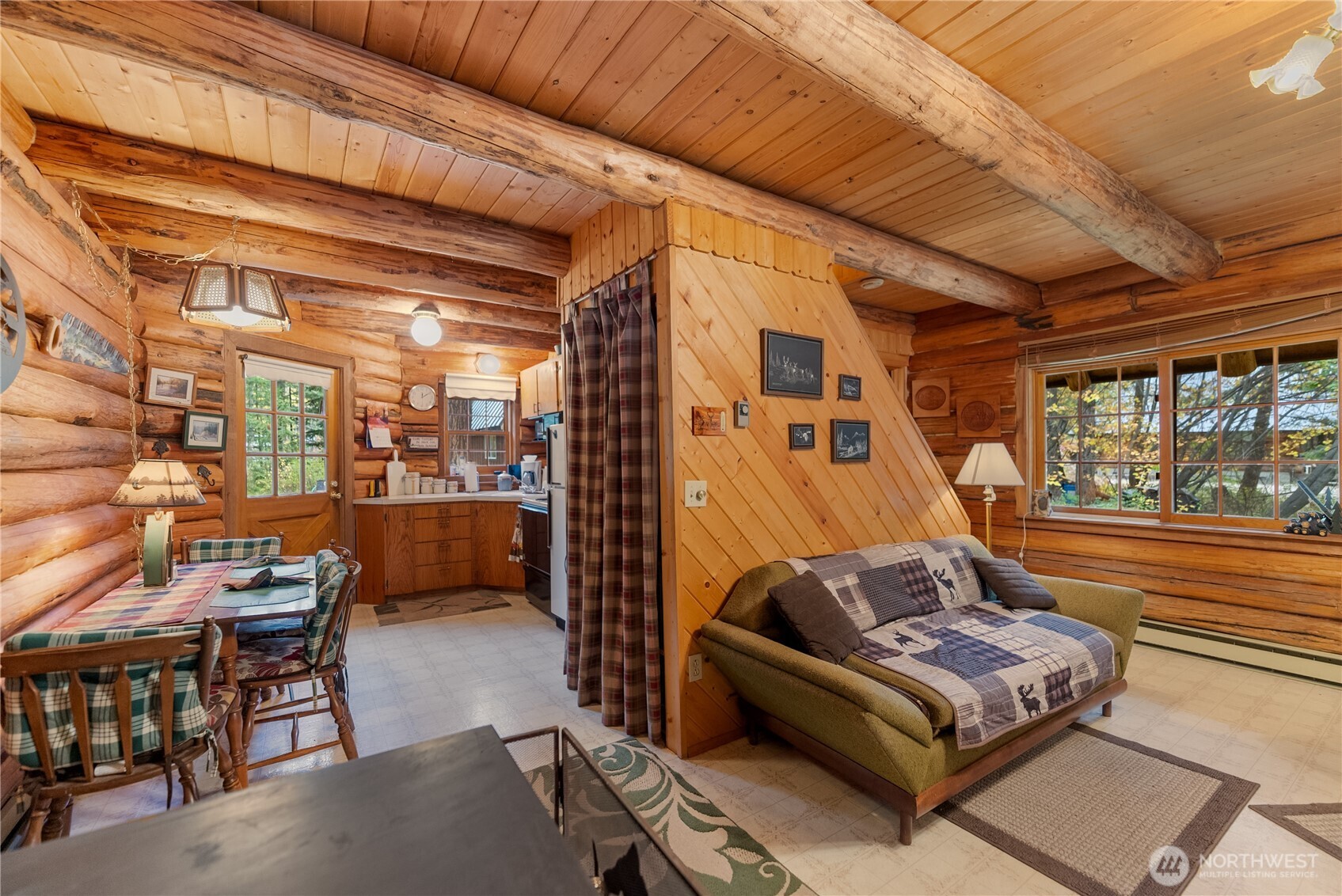 26 Mercer Road Mazama, WA 98833 - Photo 8 of 40 a outdoor living space with furniture and a potted plant