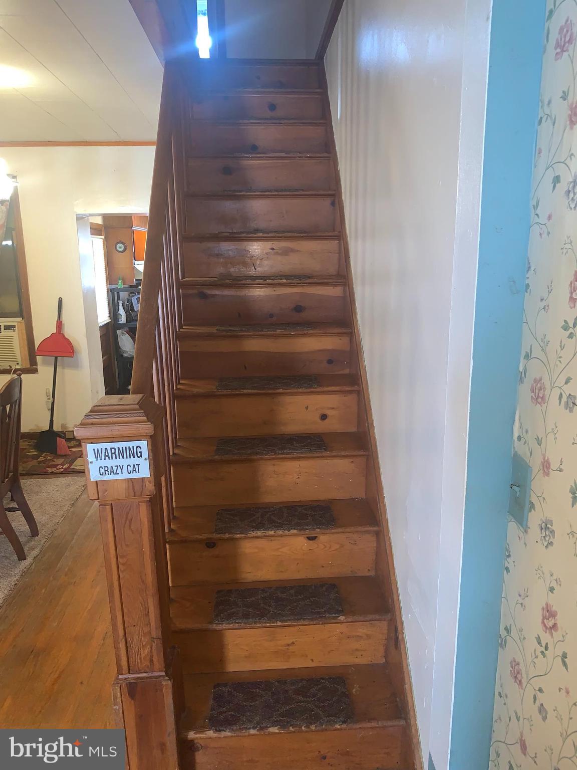 116 South Durham Street Baltimore, MD 21231 - Photo 11 of 56 Wood stairs to upper level