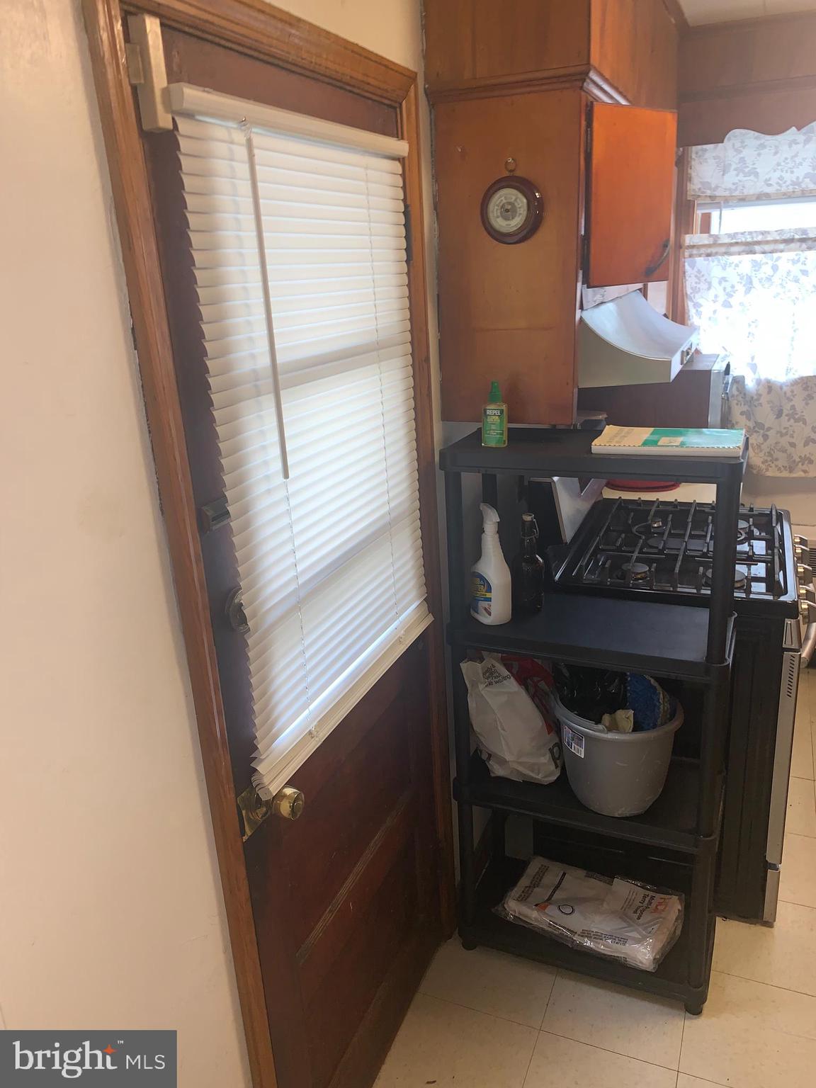 116 South Durham Street Baltimore, MD 21231 - Photo 9 of 56 Door in kitchen to patio