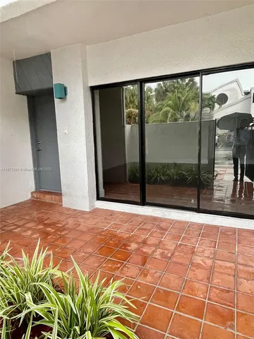 a view of a bedroom with a large window