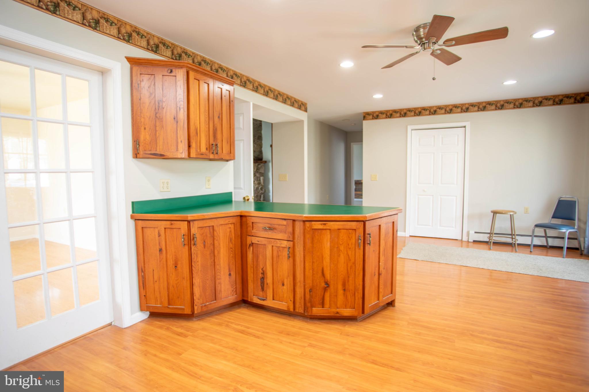 161 Coyote Run Mathias, WV 26812 - Photo 18 of 88 Spacious kitchen with warm wood accents.