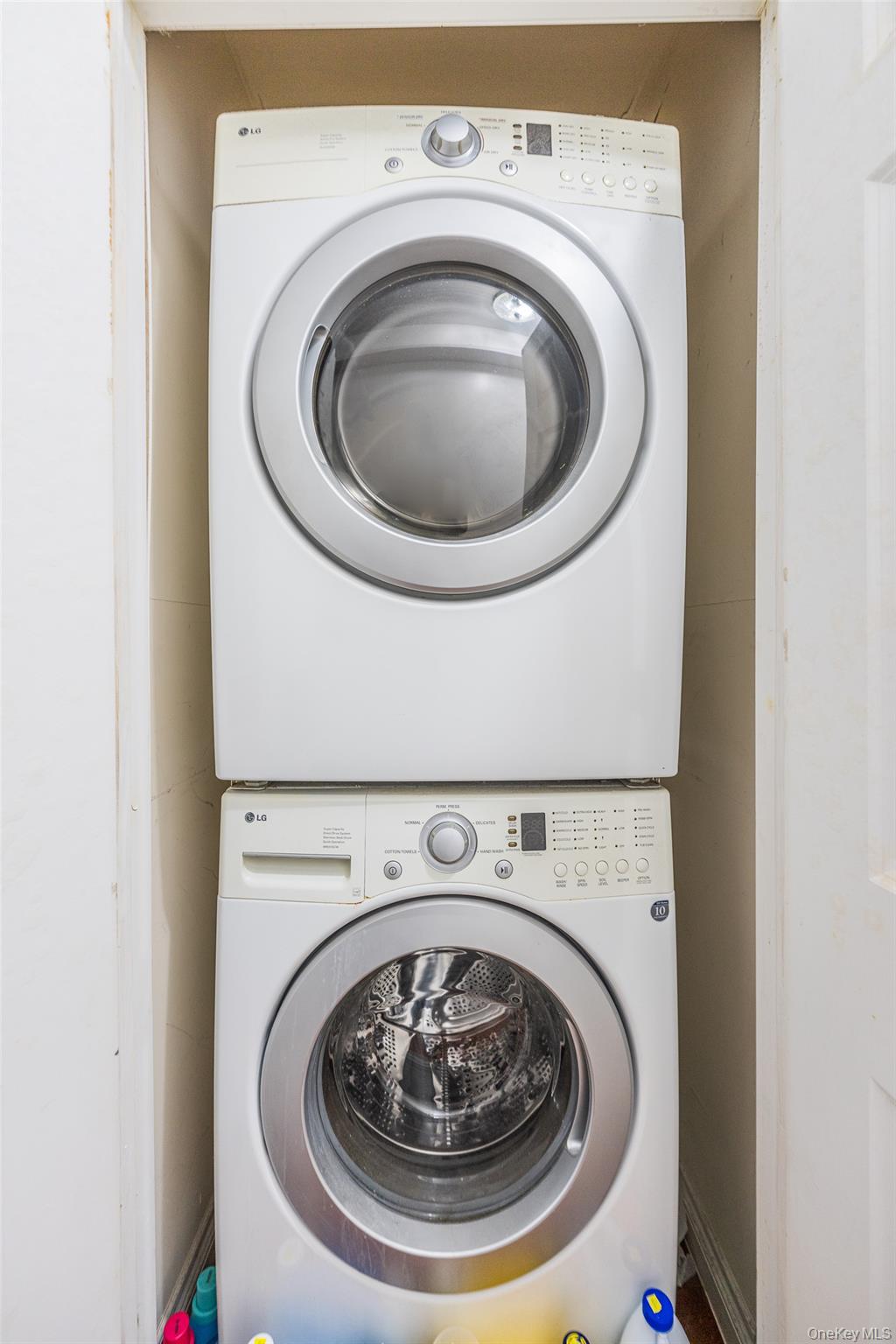 71-19 162nd Street, Unit 3D Queens, NY 11365 - Photo 10 of 14 Washroom with estacked washer and dryer