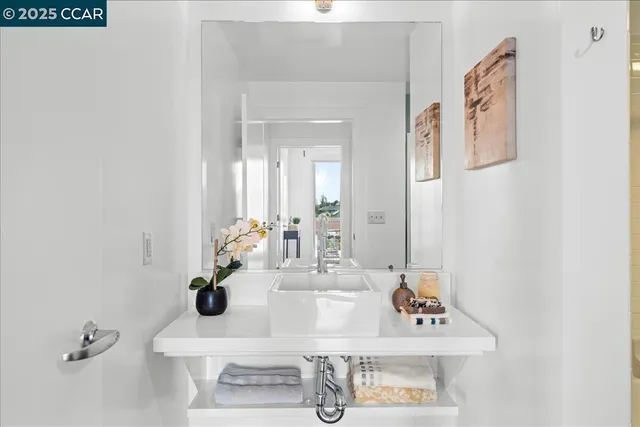 a bathroom with a bathtub and a sink