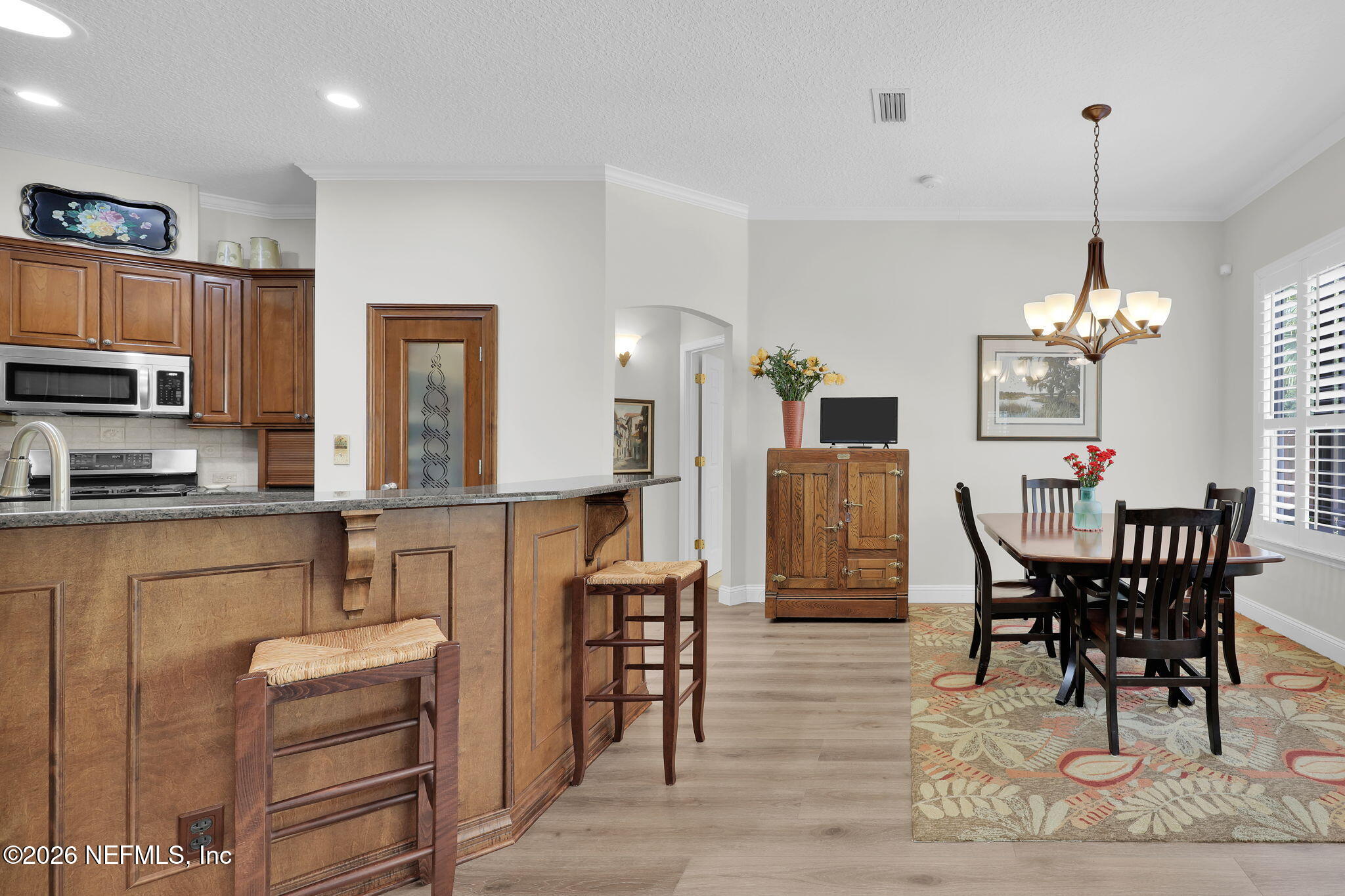 157 Oak Common Avenue St. Augustine, FL 32095 - Photo 15 of 57 a view of a dining room with furniture
