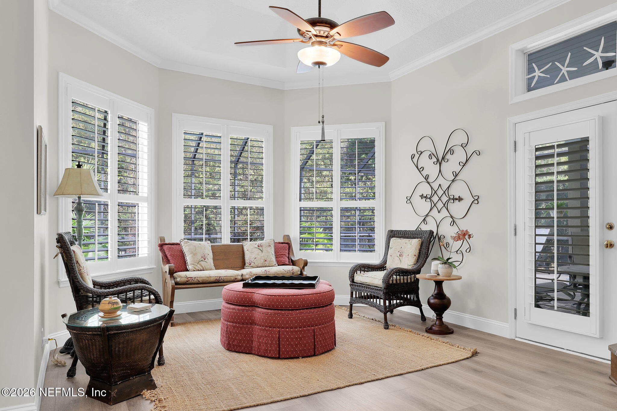 157 Oak Common Avenue St. Augustine, FL 32095 - Photo 21 of 57 a living room with furniture and a large window