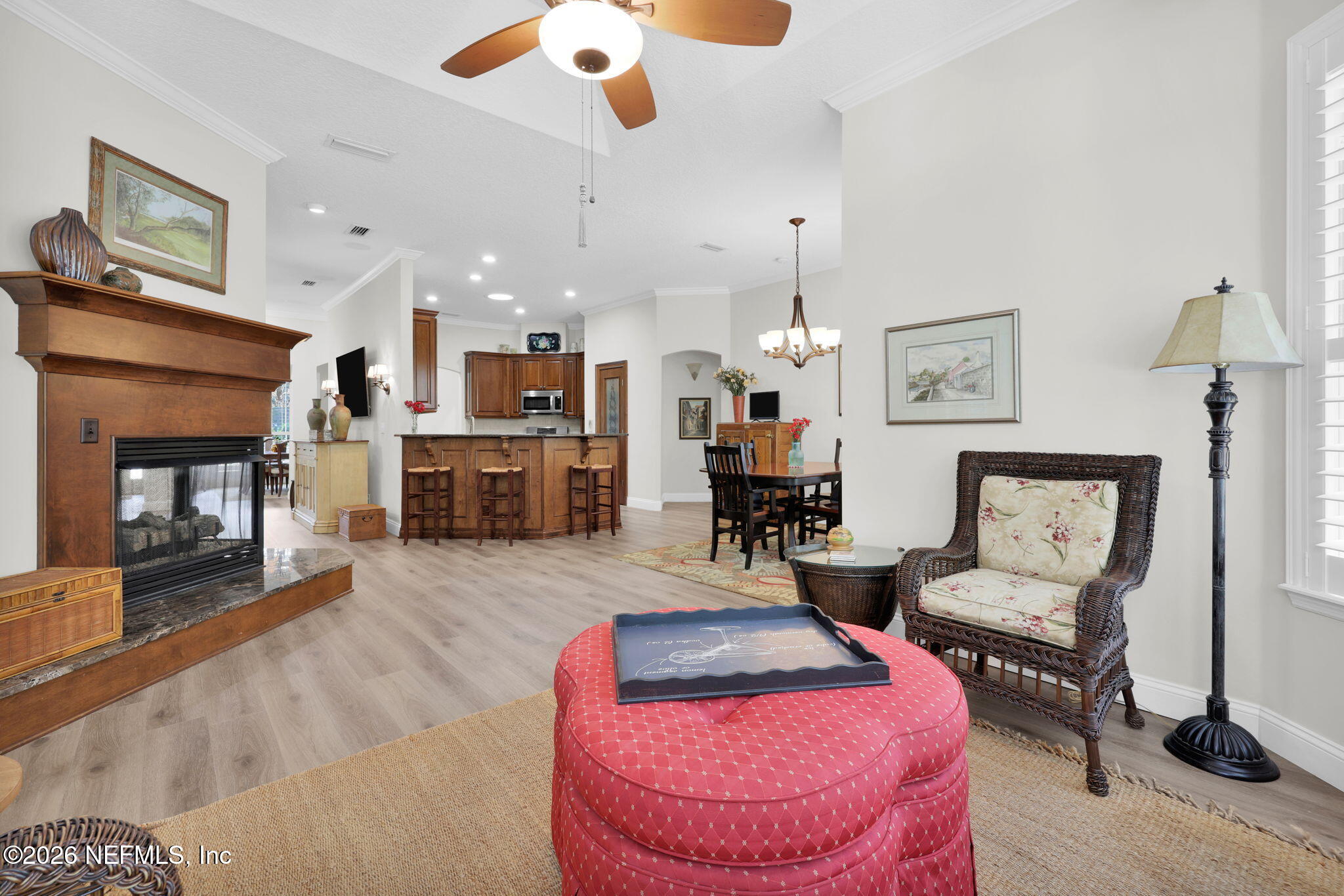 157 Oak Common Avenue St. Augustine, FL 32095 - Photo 23 of 57 a living room with furniture and a fireplace