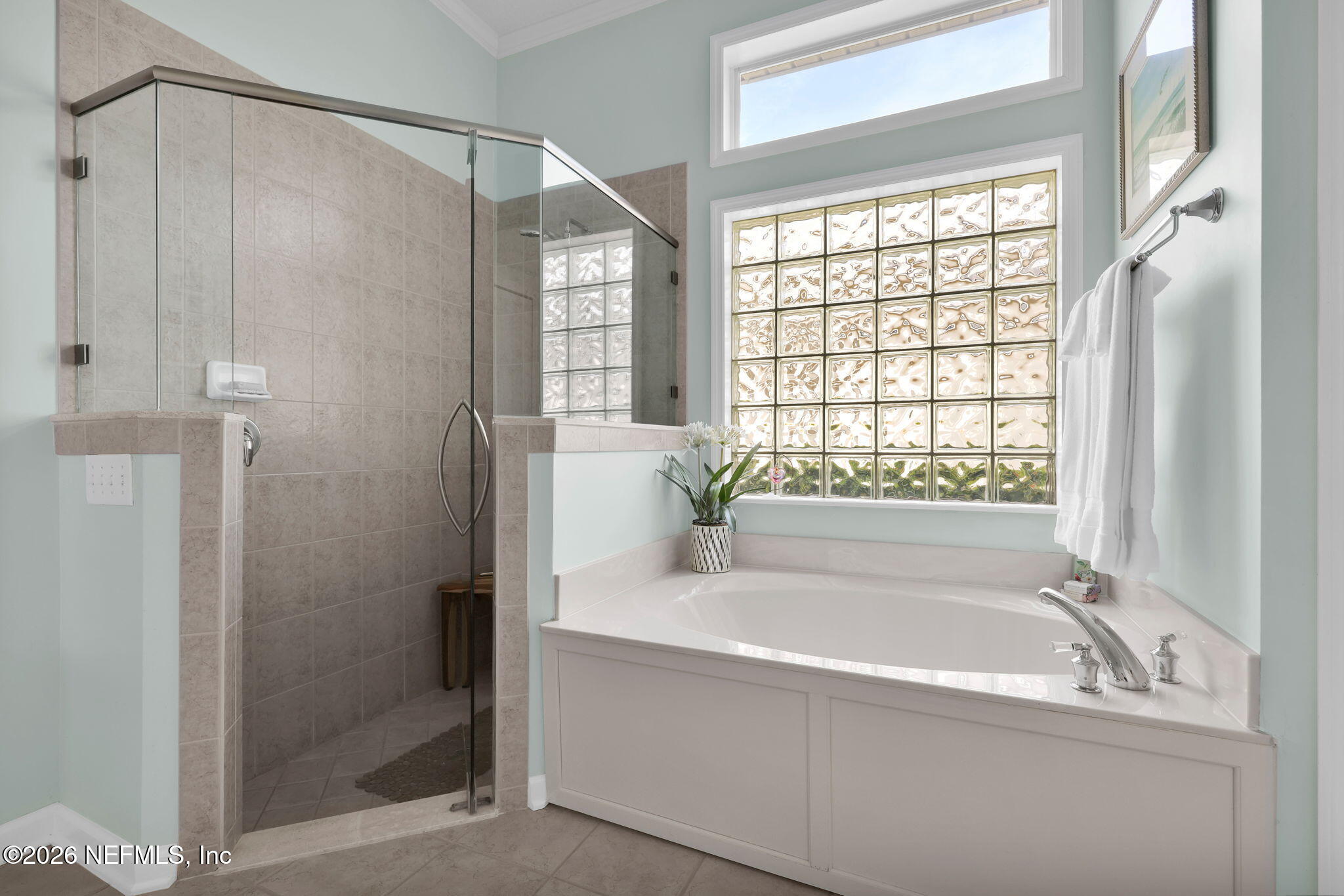 157 Oak Common Avenue St. Augustine, FL 32095 - Photo 28 of 57 a white bath tub sitting next to a shower