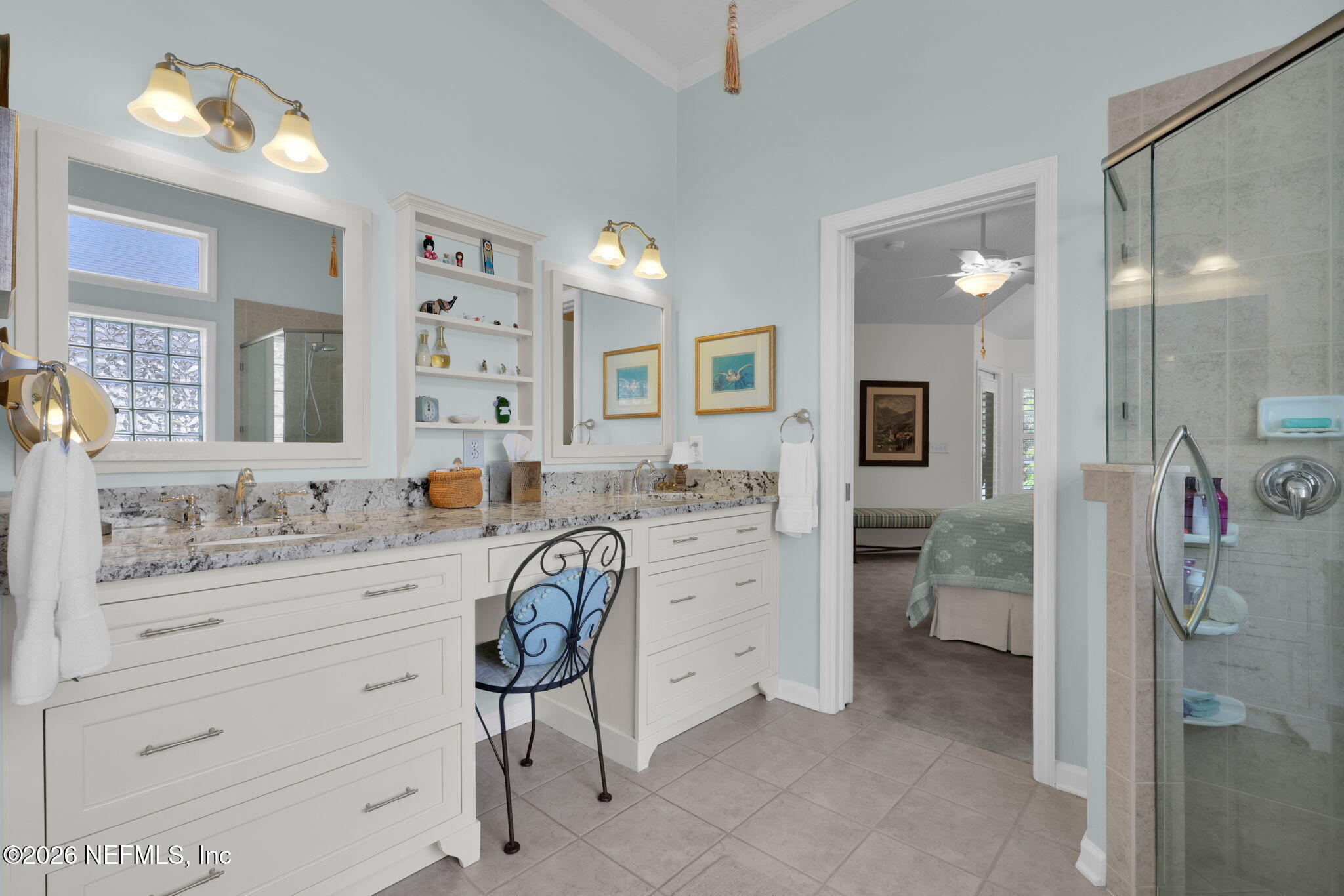 157 Oak Common Avenue St. Augustine, FL 32095 - Photo 29 of 57 a spacious bathroom with a granite countertop sink mirror and a