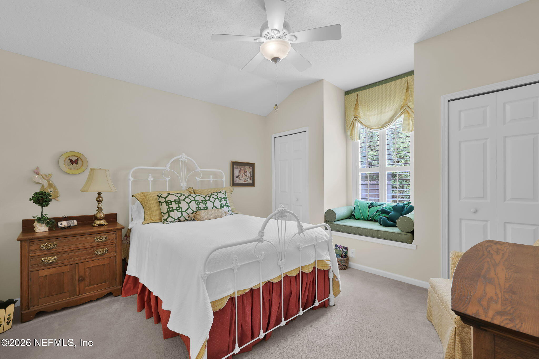 157 Oak Common Avenue St. Augustine, FL 32095 - Photo 33 of 57 a bedroom with a bed and a window