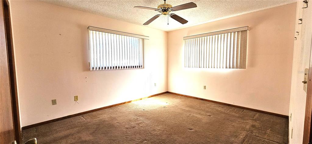 10838 Southwest 78th Court Ocala, FL 34476 - Photo 14 of 32 a view of an empty room and window