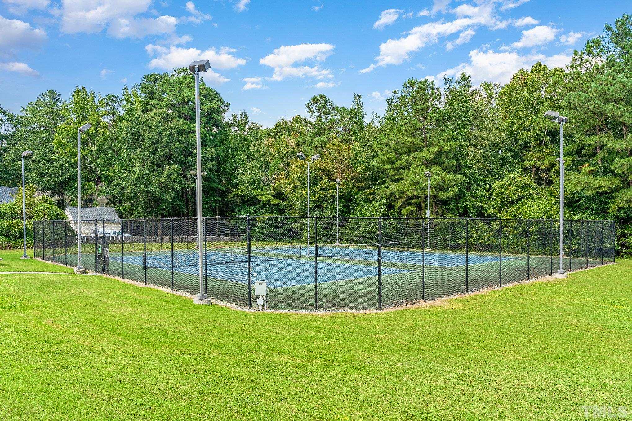 5339 Cog Hill Court Raleigh, NC 27604 - Photo 19 of 23 a view of a backyard with a small garden