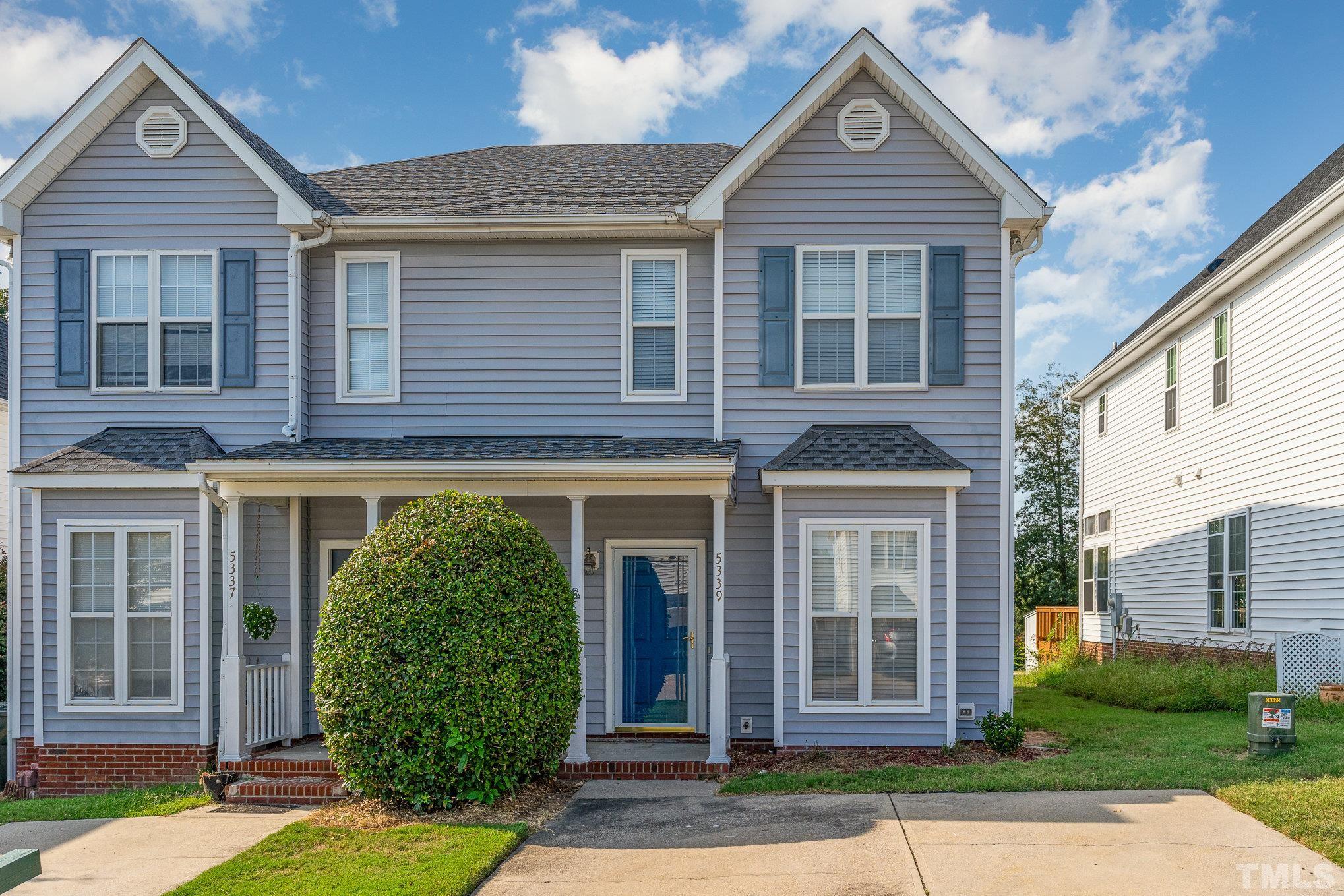5339 Cog Hill Court Raleigh, NC 27604 - Photo 2 of 23 front view of a house and a yard