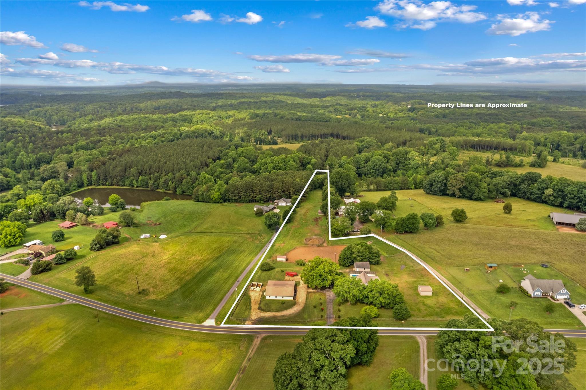 296 Hicks Creek Road Troutman, NC 28166 - Photo 6 of 48 a view of a tennis court