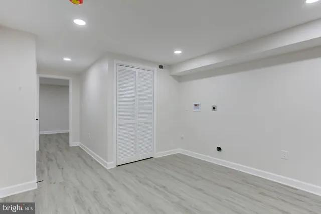 a view of a building with a backyard