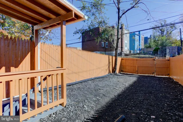 a view of balcony with wooden floor