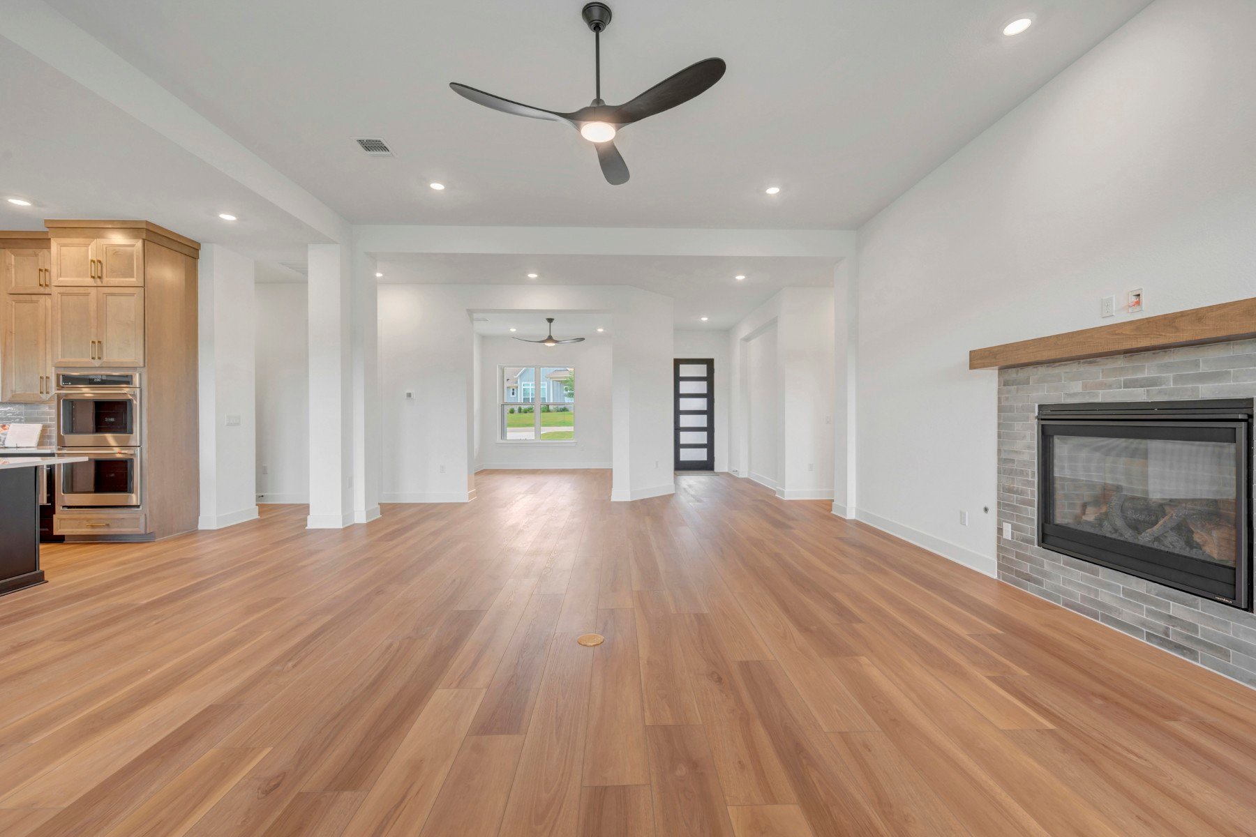 438 Rees Lndg Road Spicewood, TX 78669 - Photo 13 of 40 Family Room View towards Study and Entry