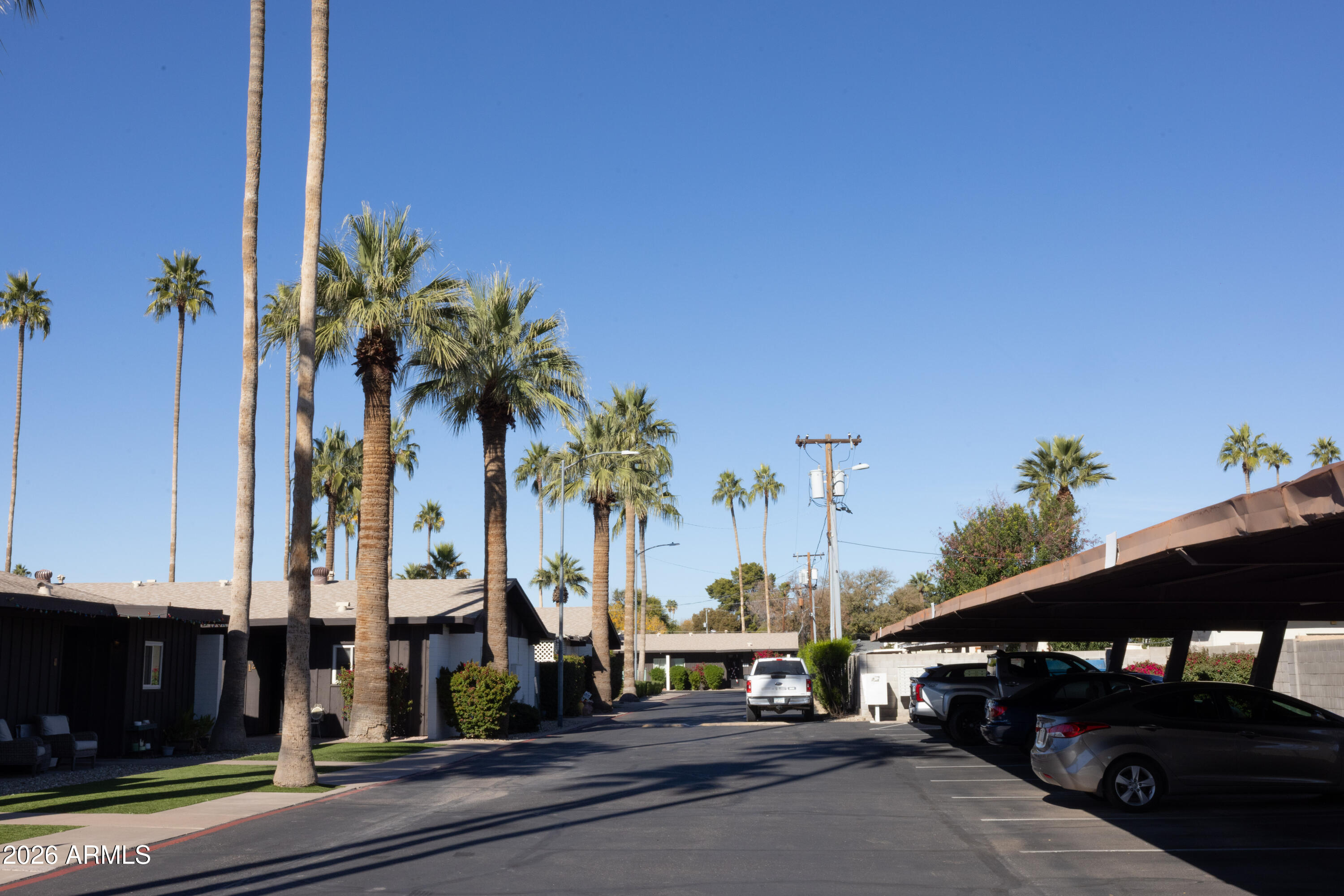 1450 East Bethany Home Road, Unit 31 Phoenix, AZ 85014 - Photo 23 of 24 a view of a street with cars