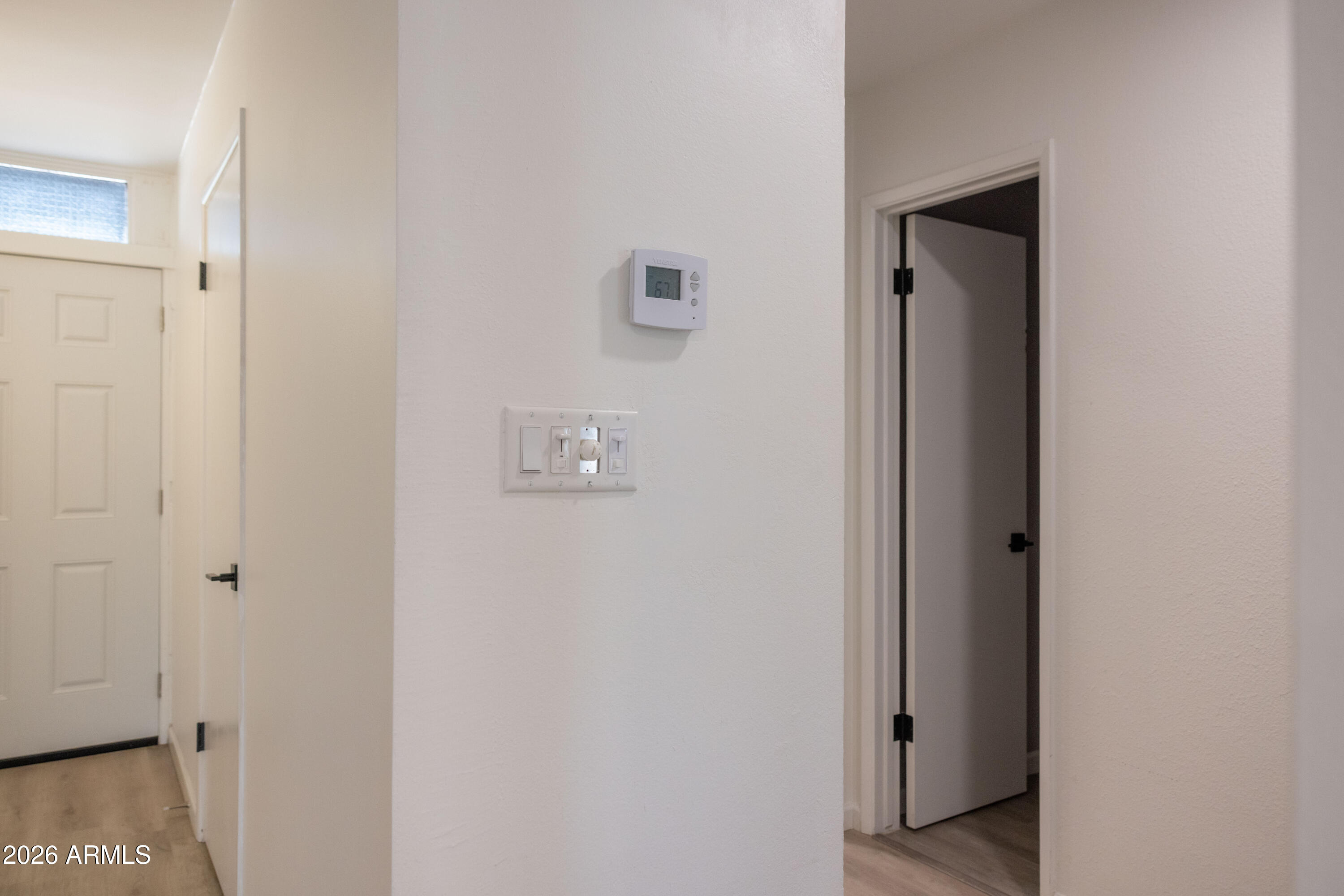 1450 East Bethany Home Road, Unit 31 Phoenix, AZ 85014 - Photo 8 of 24 a view of a hallway