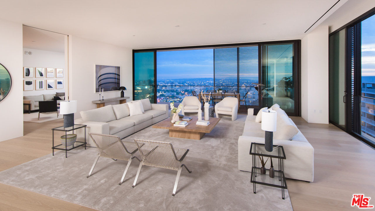 9040 Sunset Boulevard, Unit PHA West Hollywood, CA 90069 - Photo 3 of 25 a living room with furniture and a large window