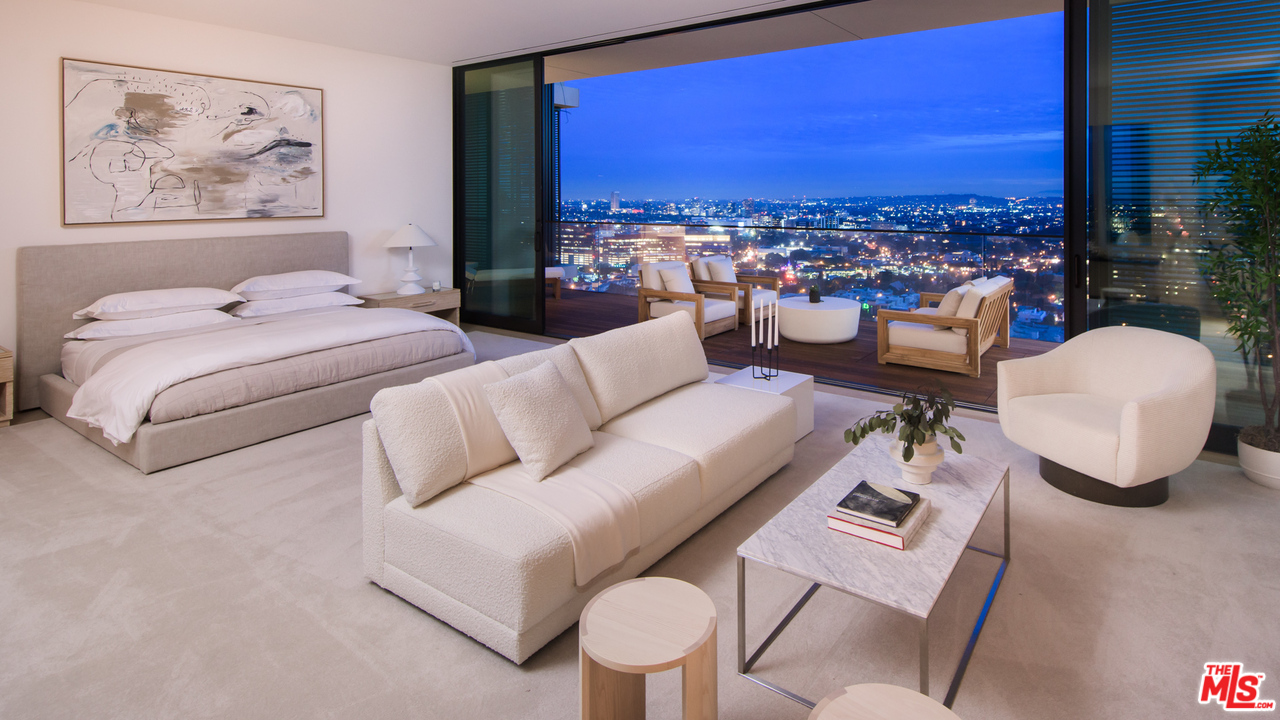 9040 Sunset Boulevard, Unit PHA West Hollywood, CA 90069 - Photo 6 of 25 a living room with furniture and a floor to ceiling window