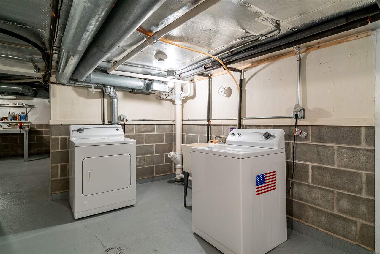 16602 Wyman School Road Caledonia, IL 61011 - Photo 18 of 25 a utility room with dryer and washer