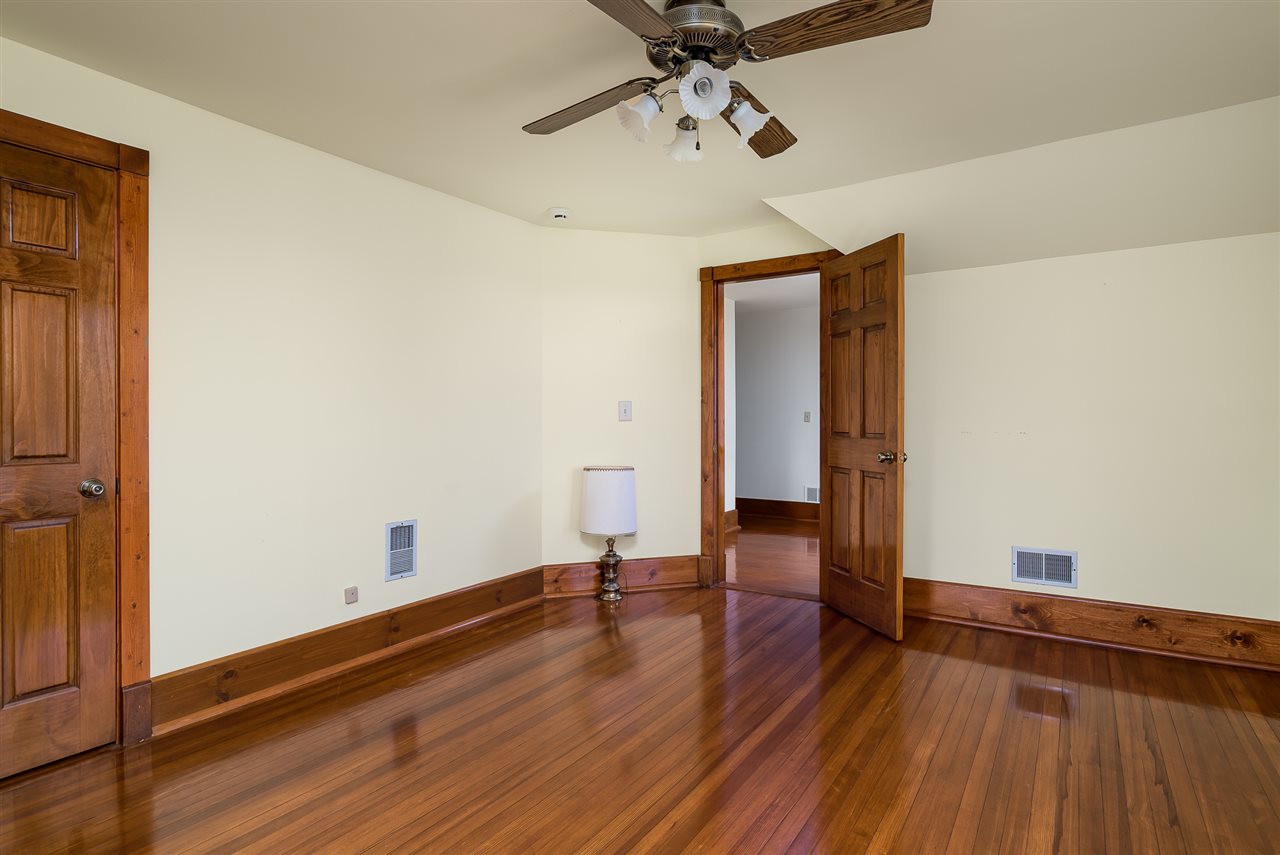 16602 Wyman School Road Caledonia, IL 61011 - Photo 21 of 25 wooden floor in an empty room
